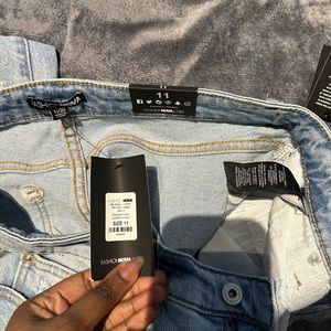 Brand new distressed jeans